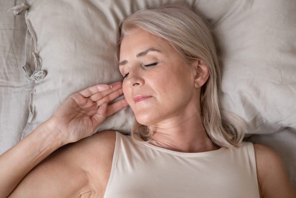 Peaceful Beautiful Mature Woman Sleeping In Bed In The Morning